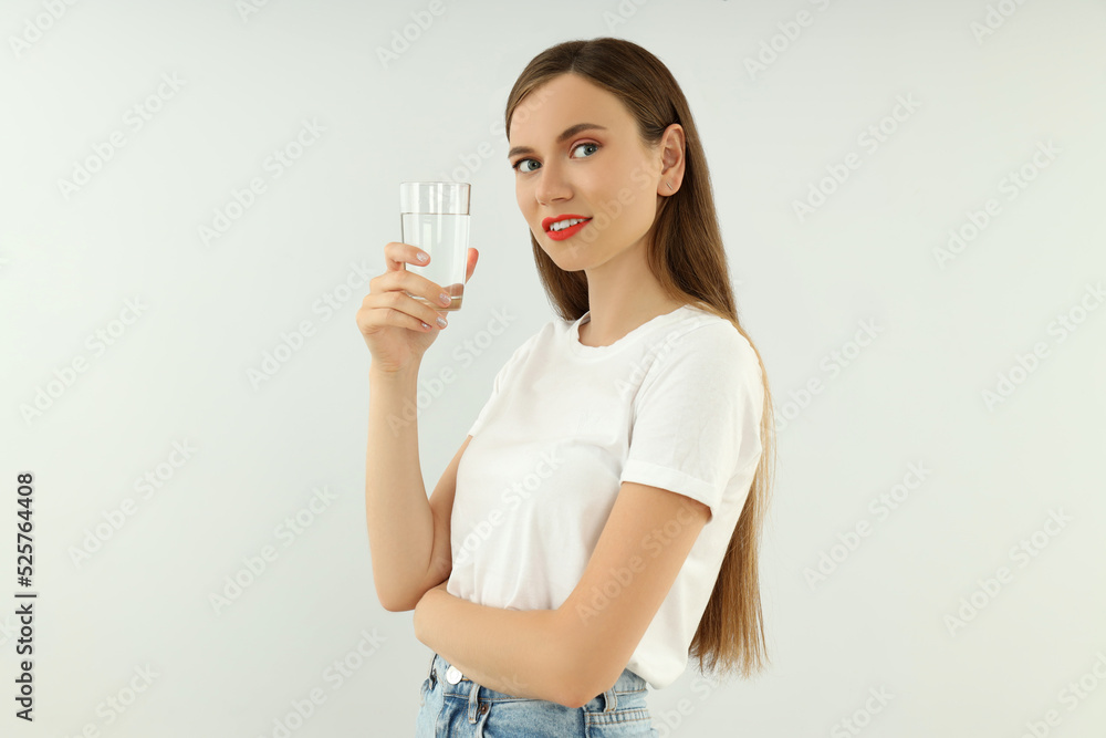 Concept of people, young woman on light background Concept of people, young woman on light background