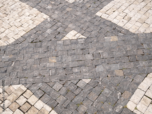 Granite paving stones on the square.
