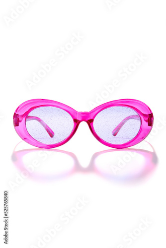 Close-up shot of women's pink oval lenses sunglasses with wide temple. Retro oval pink sunglasses are isolated on a white background. Front view.