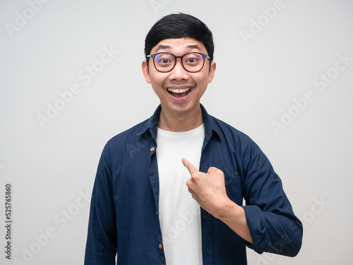 Young businessman wear glasses point finger at himself about choose me