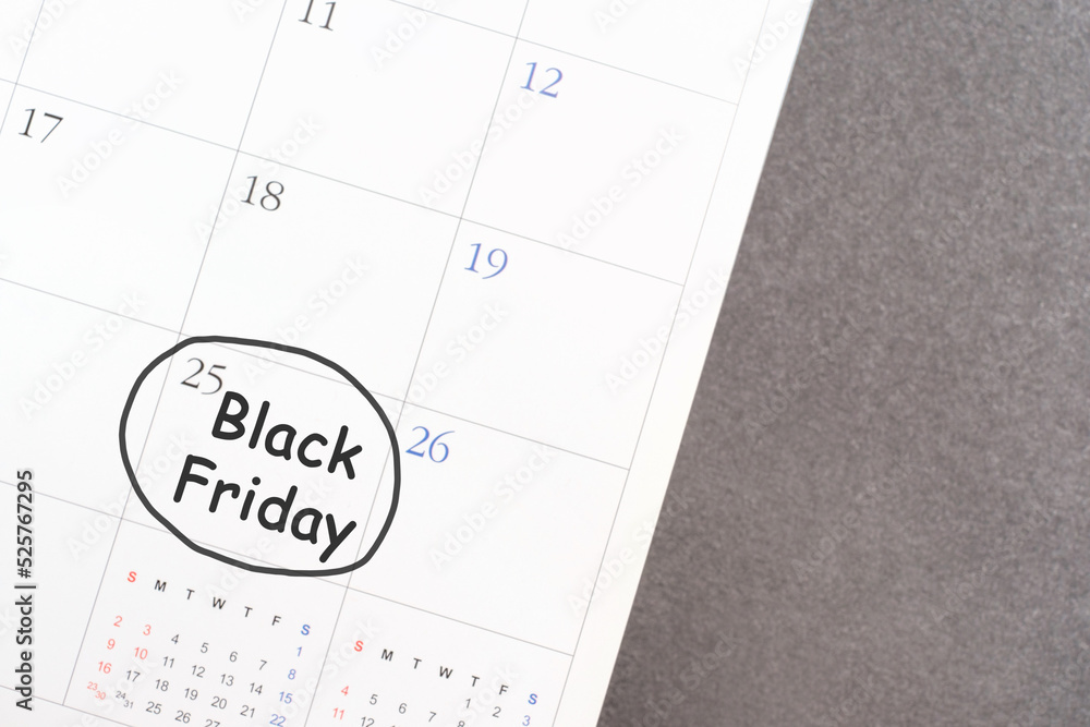 Inscription Black Friday on calendar 2022 close-up on background Inscription Black Friday on calendar 2022 close-up on background