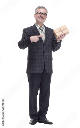 friendly man with a gift box looking at you. isolated on a white