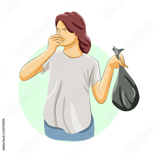Woman lifting smelling garbage toxic