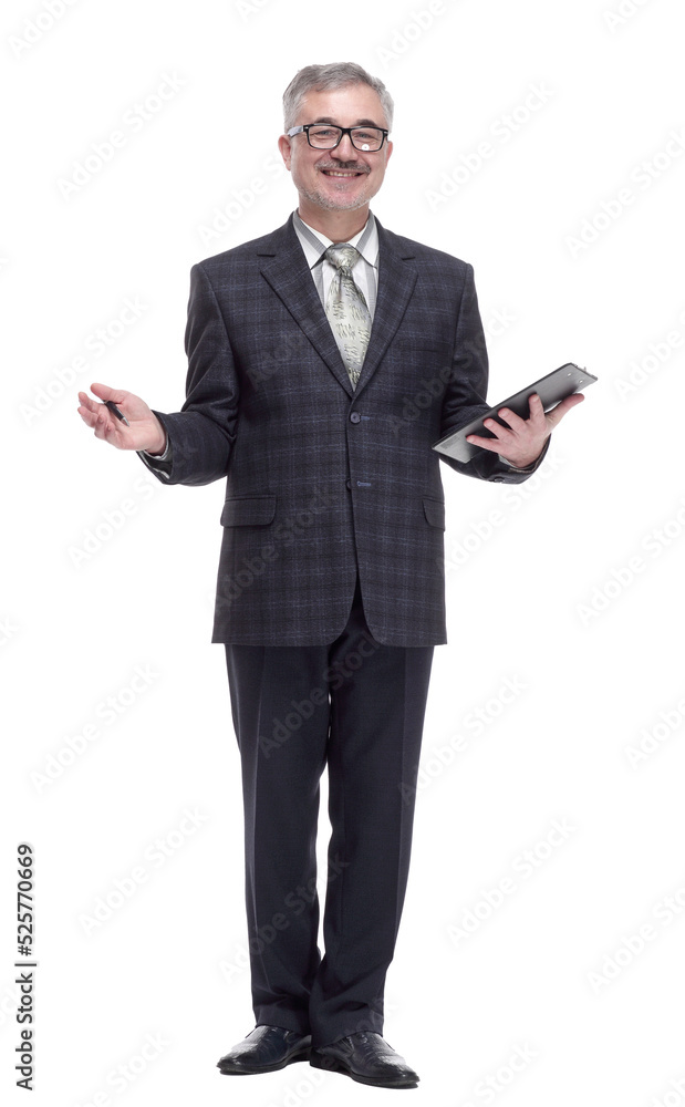in full growth. business man making an entry in the clipboard. in full growth. business man making an entry in the clipboard.