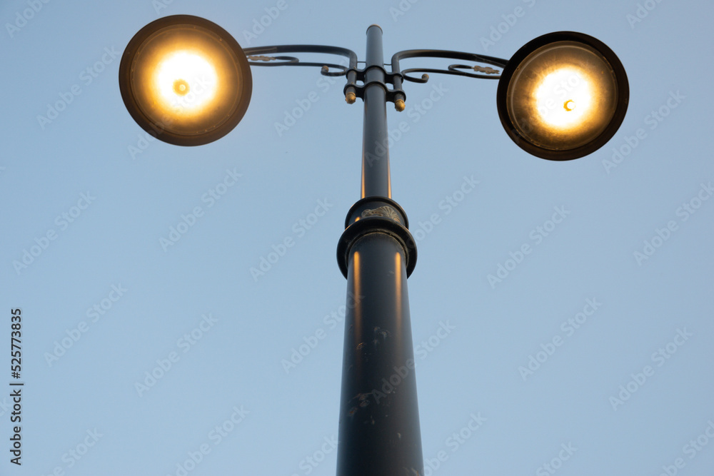 Lit old street lamp at sunset in Turkey. Lit old street lamp at sunset in Turkey.