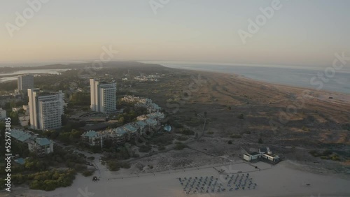 Wonderful scenery evening sky over troia beach. Aerial view of river in wild flora surrounding. Europe photo