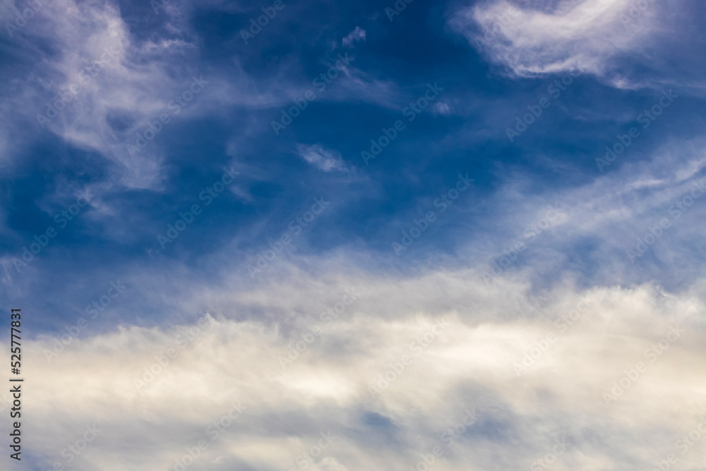 cloudy blue sky with approaching storm clouds, abstract background