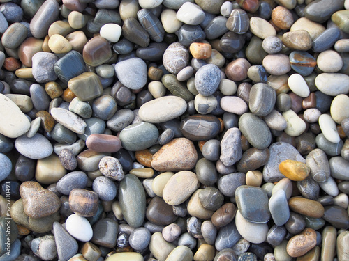 Pebbles, stone texture, natural abstract background. Sea pebbles, close-up.