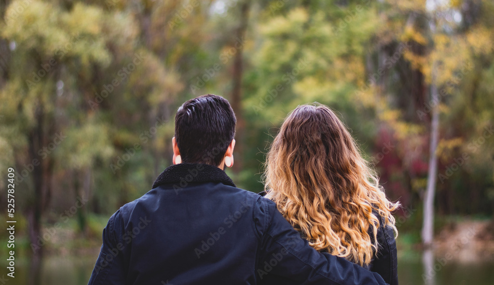 Cute Couple Sitting In The Forest - Relationship Cute Couple Sitting In The Forest - Relationship