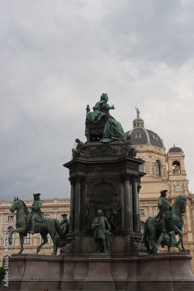 a young European-looking girl poses on Maria Theresa Square in Vienna