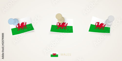 Pinned flag of Wales in different shapes with twisted corners. Vector pushpins top view.