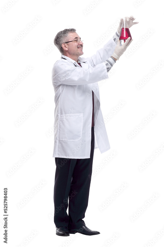 smiling doctor looking at the liquid in the flask smiling doctor looking at the liquid in the flask