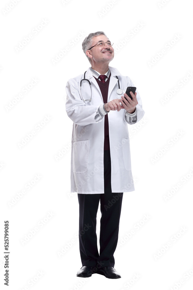 smiling doctor with a smartphone looking at a white screen. smiling doctor with a smartphone looking at a white screen.