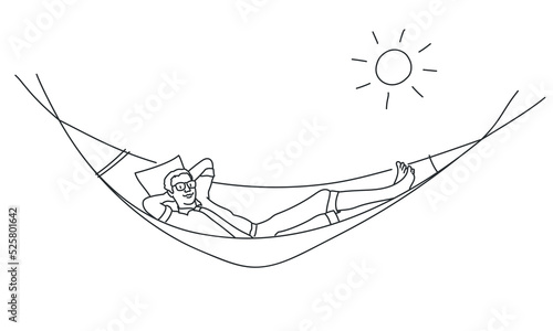 Young smiling man relaxing in hammock.