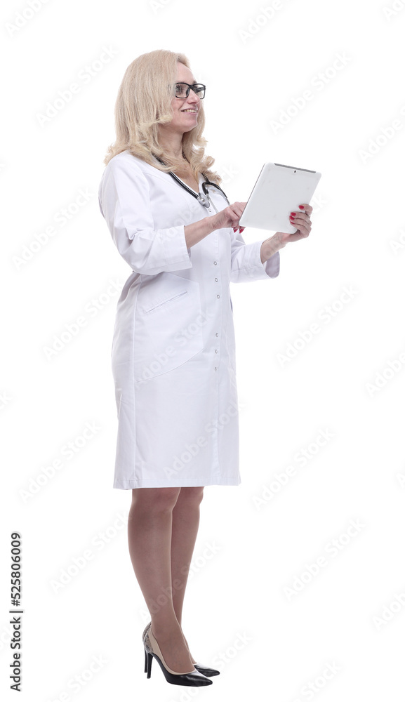 female doctor reading a message on a digital tablet. female doctor reading a message on a digital tablet.