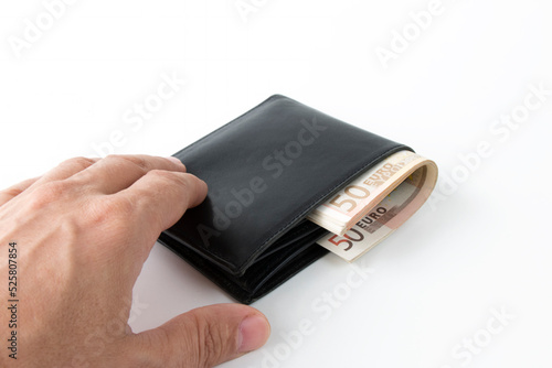 hand hand over wallet with money isolated on white background