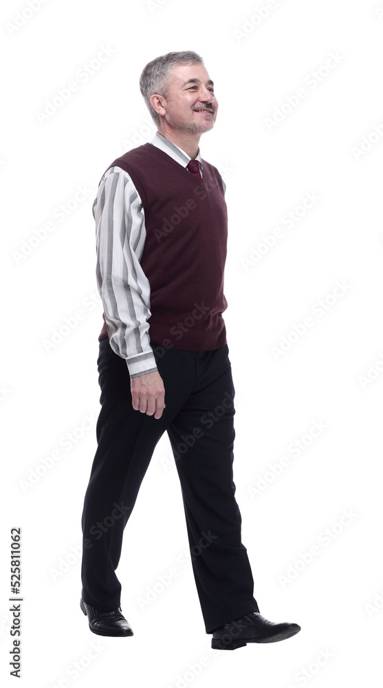 smiling mature man striding forward. isolated on a white smiling mature man striding forward. isolated on a white