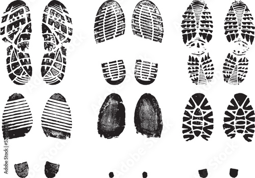 Set of scanned and converted into vector images double footprints, men and women, stamped with black ink