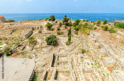 The crusaders' castle in the historic city of Byblos in Lebanon. A view of the western part of the ancient site from the top of the castle and the Mediterranean sea. 