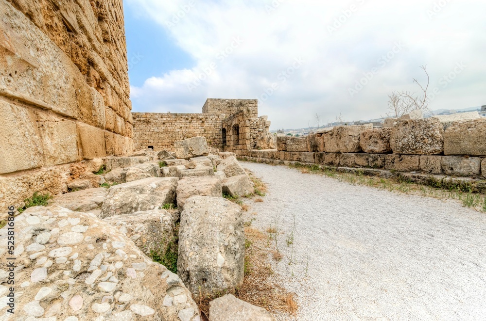 The exterior of the crusaders' castle in the historic city of Byblos in Lebanon. A view of the southern part of the castle, the arcs and towers of the castle into the courtyard.