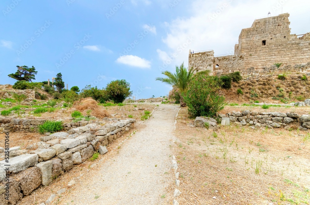 The crusaders' castle in the historic city of Byblos in Lebanon. A view of the western walls and a path leading to the east of the ancient site discovered in the area.
