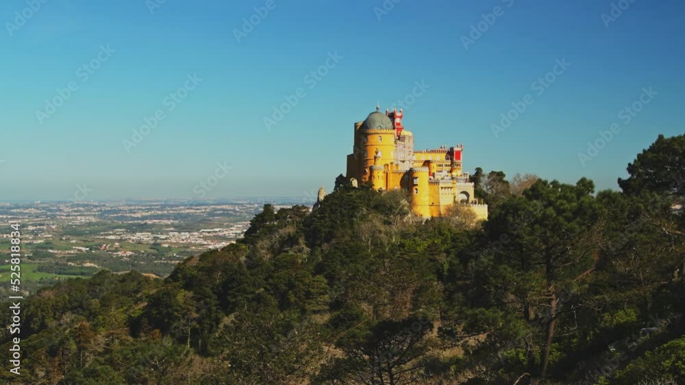Aerial Drone View of Pena Palace, Sintra, Lisbon, Portugal, and the beautiful forest and mountain landscape, UNESCO World Heritage Site Architecture and Popular Tourist Attraction, Europe Aerial Drone View of Pena Palace, Sintra, Lisbon, Portugal, and the beautiful forest and mountain landscape, UNESCO World Heritage Site Architecture and Popular Tourist Attraction, Europe