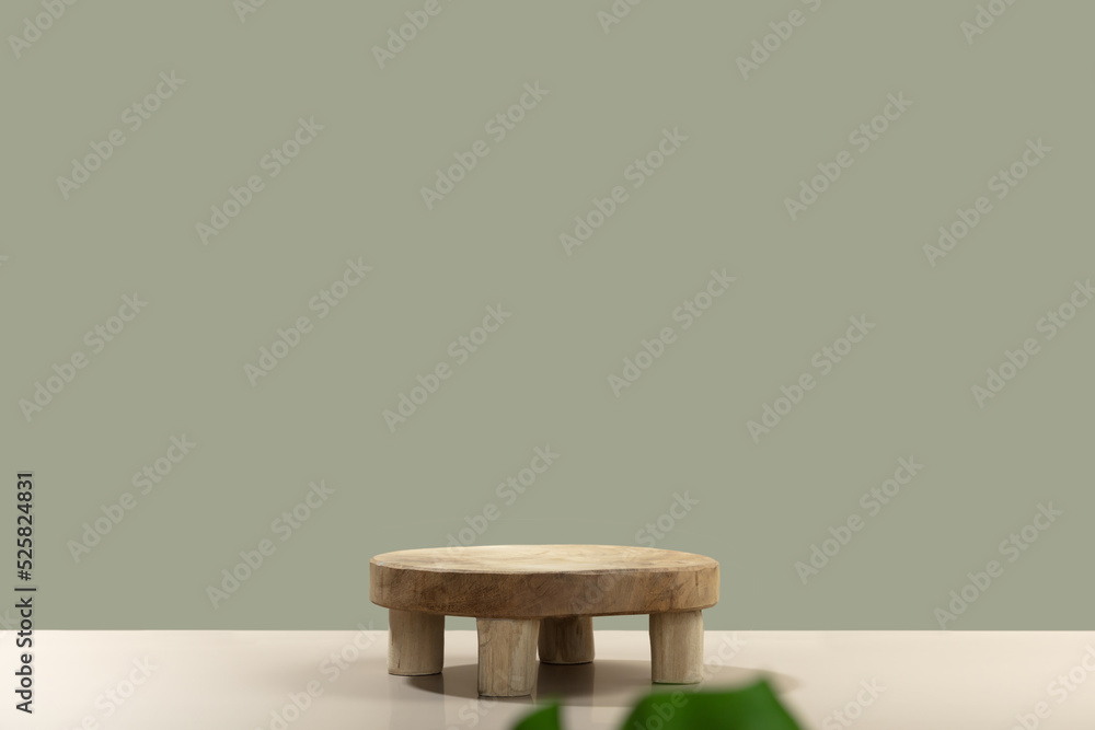 Empty round wooden podium for product presentation and monstera leaves on natural background for cosmetic product mockup Empty round wooden podium for product presentation and monstera leaves on natural background for cosmetic product mockup