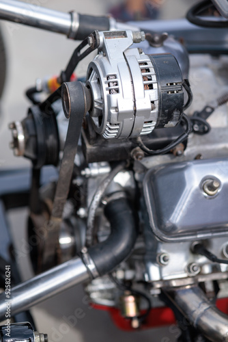 close-up of a car engine, an internal combustion engine.