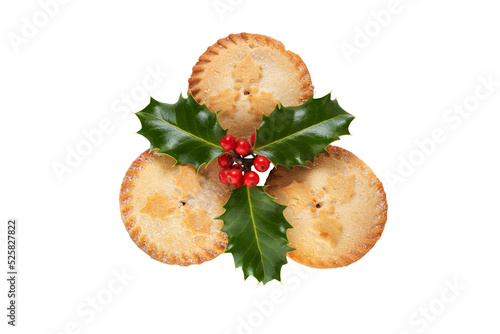Obraz na płótnie Three Christmas mince pies with holly isolated against a flat background. w salonie