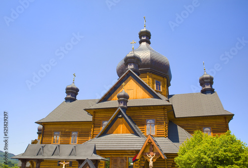 Wooden Vasilyevskaya Church in Kosiv, Ukraine photo