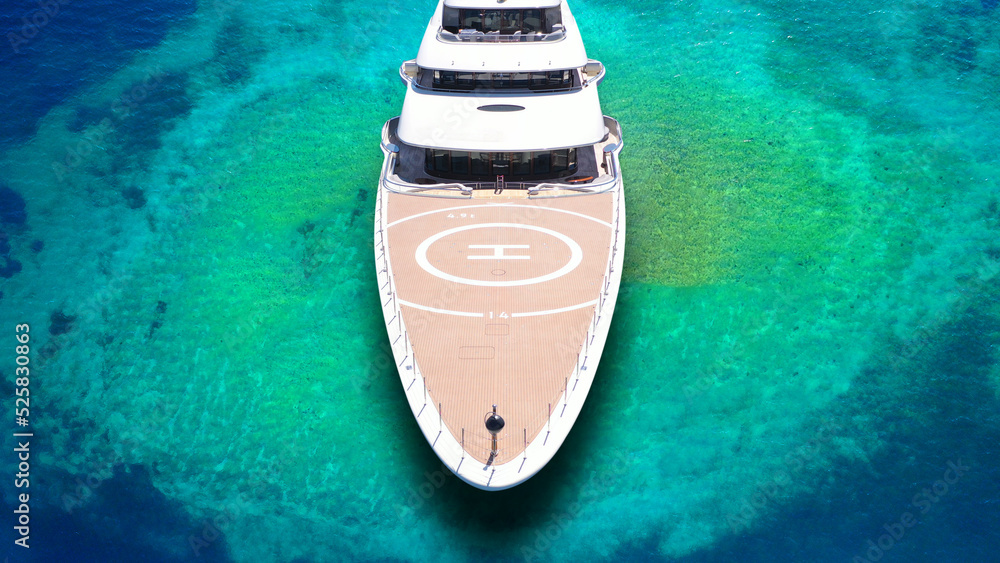 Aerial drone top down ultra wide photo of luxury yacht anchored in ...