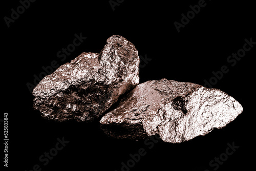 copper ore isolated on black background, used in the production of electrically conductive materials, wires and cables, tin, zinc, metal alloys, brass and bronze.