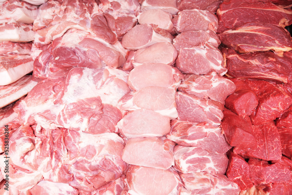 Top view of raw meat on a supermarket shelf. Fresh meat products