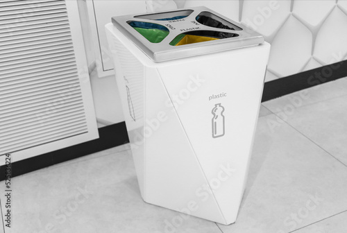 white sorting bin in shopping mall, zero waste