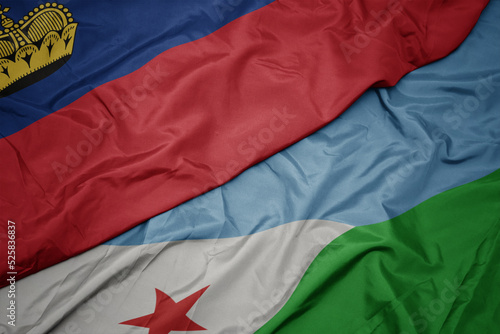 waving colorful flag of djibouti and national flag of liechtenstein.