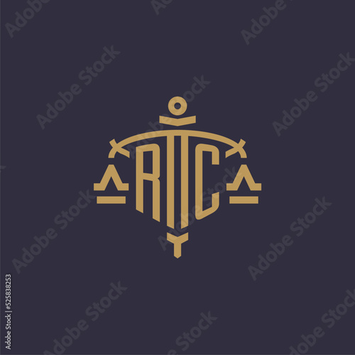 Monogram RC logo for legal firm with geometric scale and sword style