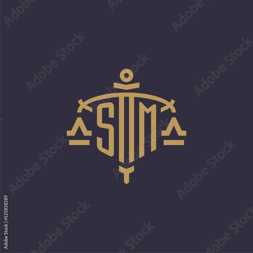 Monogram SM logo for legal firm with geometric scale and sword style