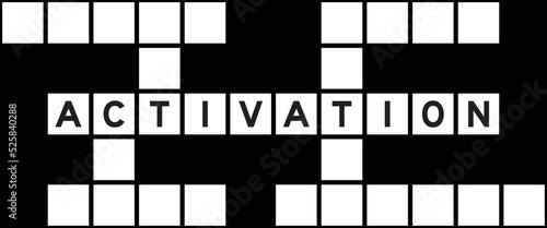 Alphabet letter in word activation on crossword puzzle background