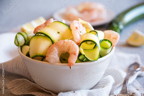 Fresh zucchini with shrimps, healthy and delicious food photo