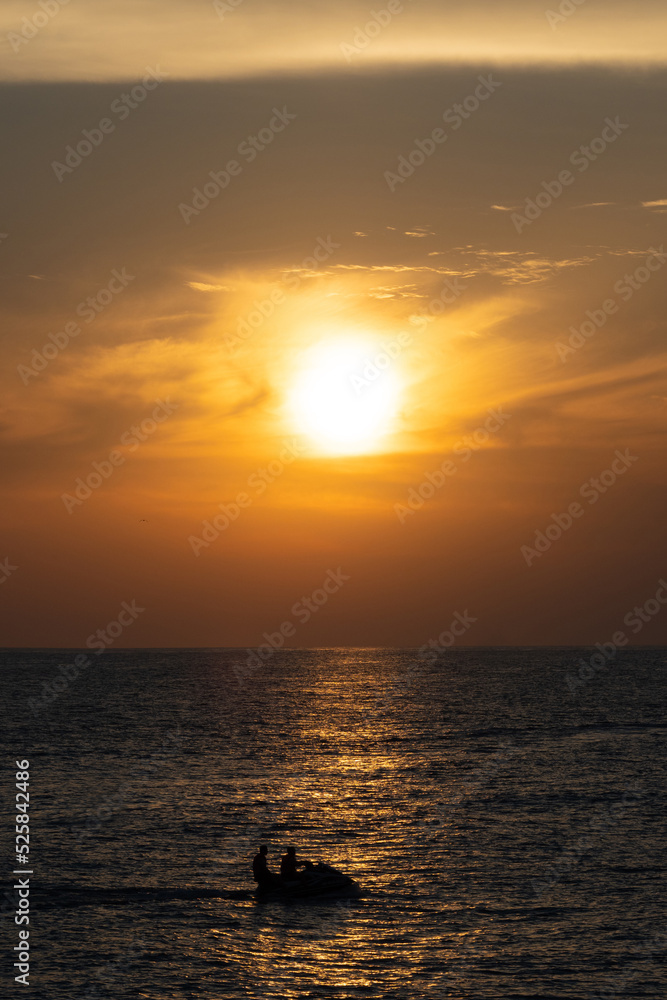 red sunset in the sea, gentle romantic natural background. Unity with nature