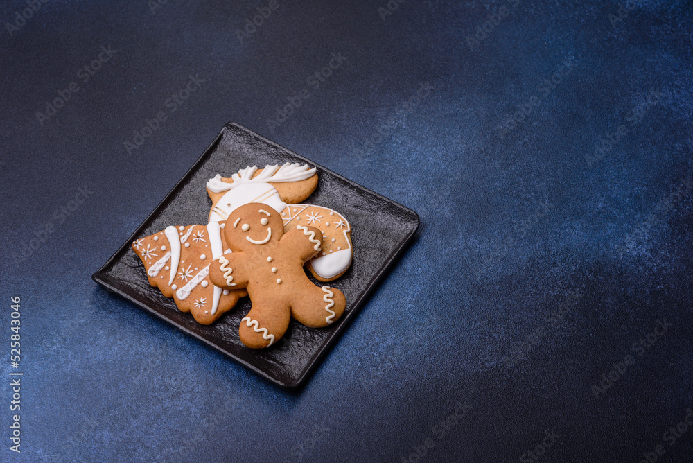 Christmas decorations and gingerbreads on a dark concrete table. Getting ready to celebration