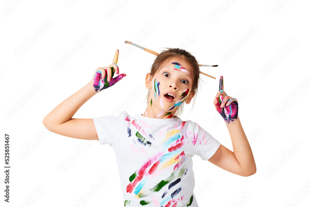 little child girl in colorful paint with paintbrush in hair little child girl in colorful paint with paintbrush in hair