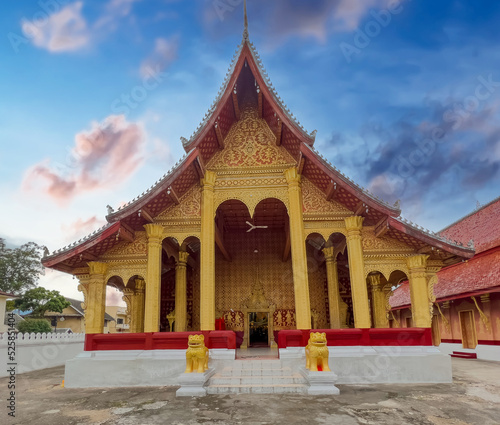 Wallpaper Mural Beautiful Wat Buddhist temples in Luang Prabang Laos. Decorated in beautiful ornate colours of red and Gold and Blue. Lovely Sky Torontodigital.ca