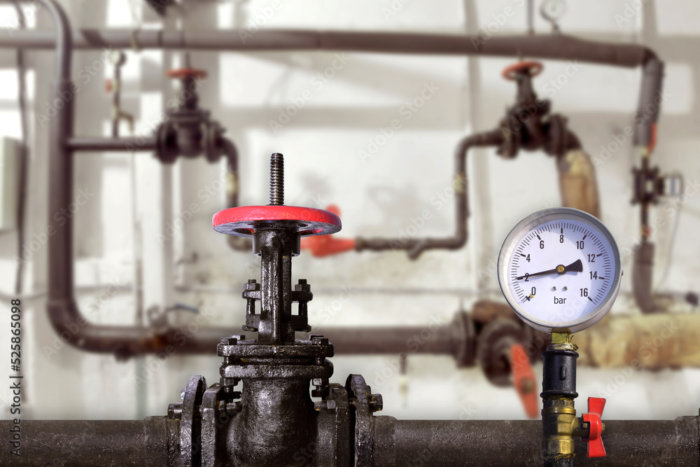 Fototapeta premium Taps on old water pipes or gas system. Heating of the room. Energy industry. Industrial Measuring sensor. Process pipeline.