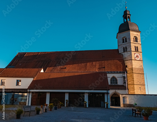 Beautiful church on a summer evening at the famous Bogenberg mountain, Bogen, Danube, Bavaria, Germany photo