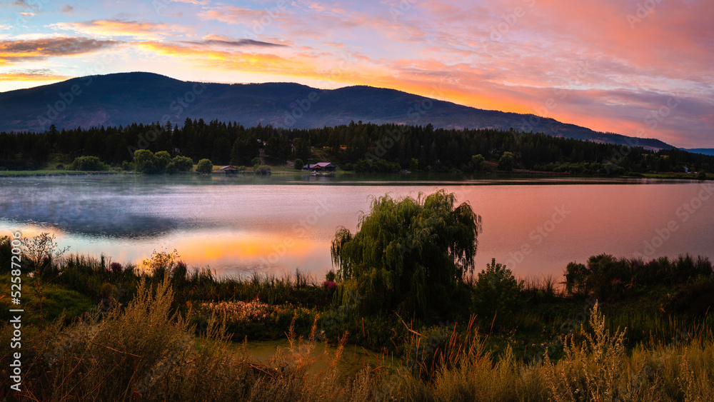 Sunrise tranquil landscape at Otter Lake in Armstrong, British Columbia, Canada Sunrise tranquil landscape at Otter Lake in Armstrong, British Columbia, Canada