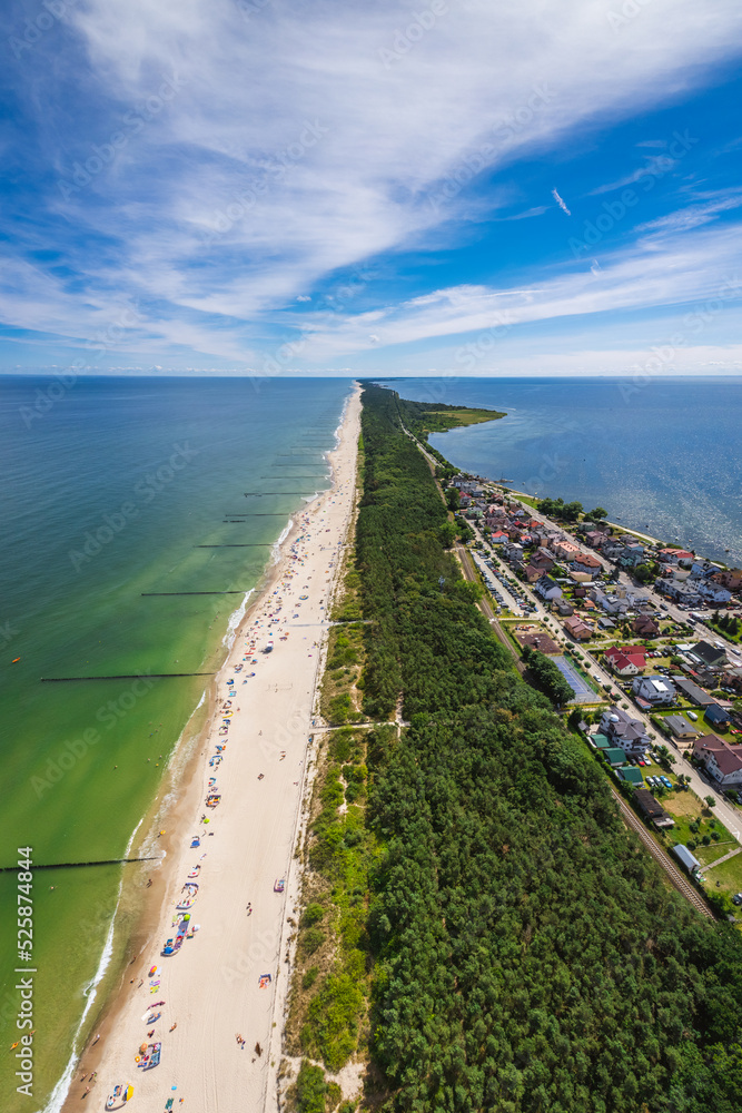Obraz premium Summer view from the air of the Hel Peninsula, a calm and nice landscape over Chalupy village.
