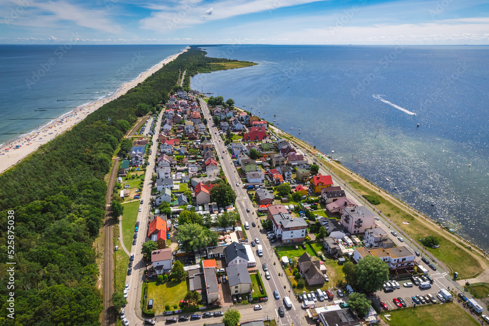 Summer view from the air of the Hel Peninsula, a calm and nice landscape over Chalupy village. - obrazy, fototapety, plakaty 