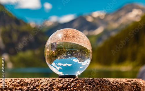 Crystal ball alpine landscape shot at the famous Vilsalpsee lake, Tannheim, Tyrol, Austria