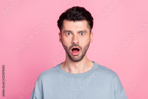 Portrait of shocked speechless person open mouth cant believe staring isolated on pink color background